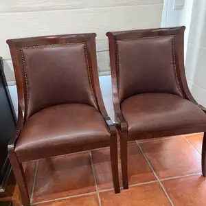 Pair of premium brown leather dining chairs elegant nailhead trim, Nicosia — Aglantzia