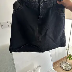 Black short denim skirt, Nicosia — Aglantzia