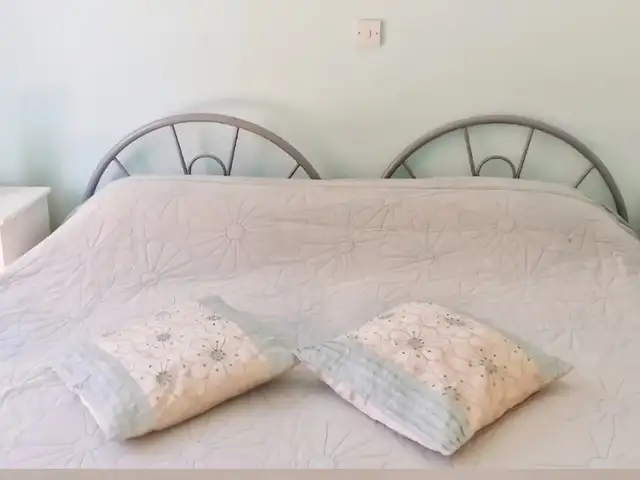 Two single silver metal beds, Paphos — Pegeia