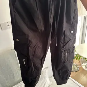 Black cargo pants, Nicosia — Aglantzia