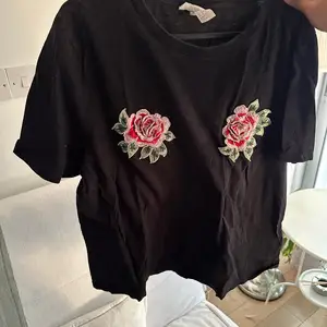 Black floral top, Nicosia — Aglantzia