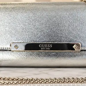 Guess clutch bag, Επαρχία Λεμεσού — Άγιος Τύχων