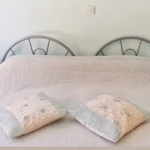 Two single silver metal beds, Paphos — Pegeia