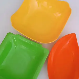 Bright green, yellow, red rigid plastic plate with small tab handles on the side, Επαρχία Λευκωσίας — 'Έγκωμη