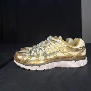 Nike p-6000 metallic gold, Nicosia — Geri